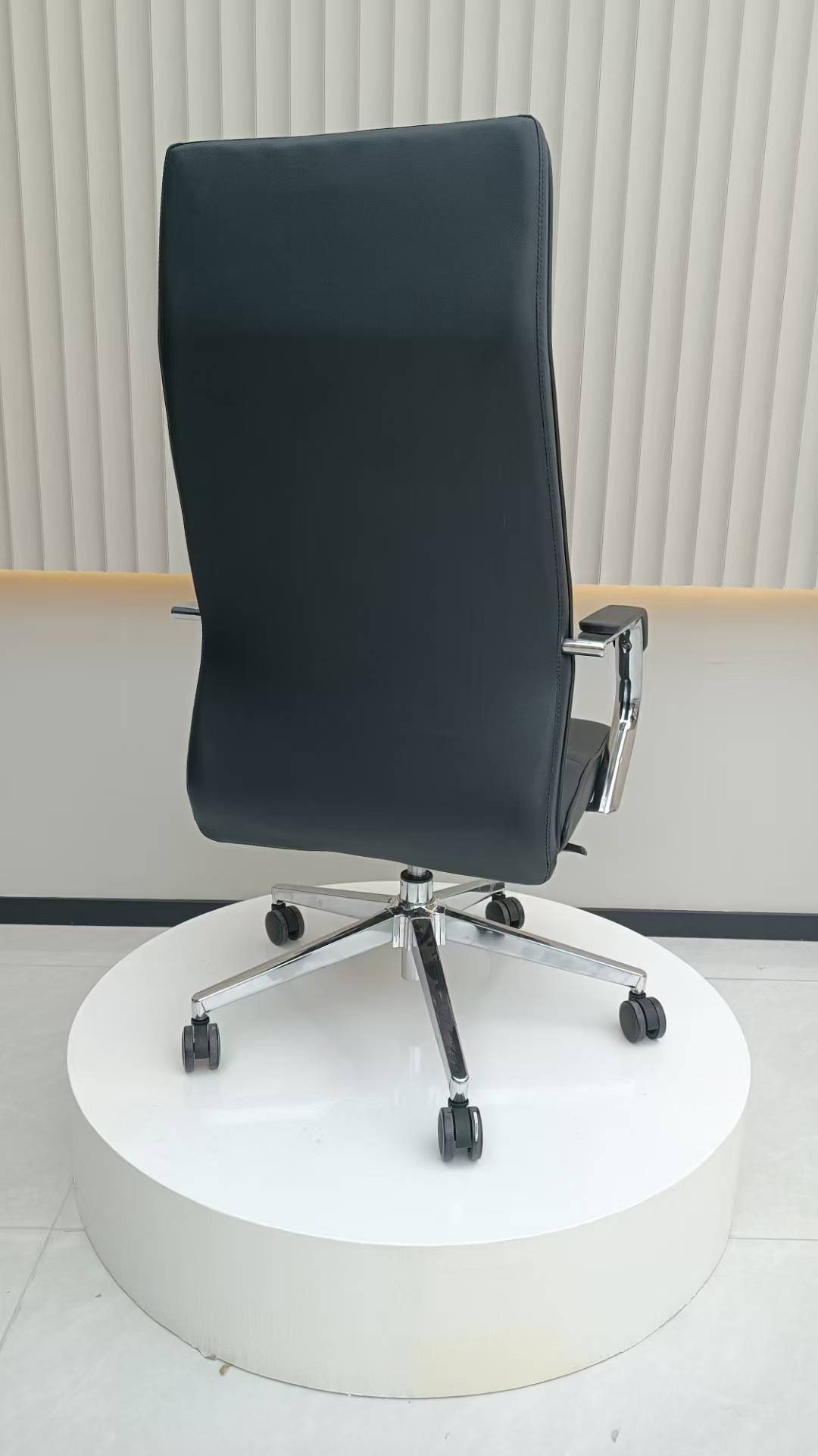 Modern minimalist style black leather office chair description
